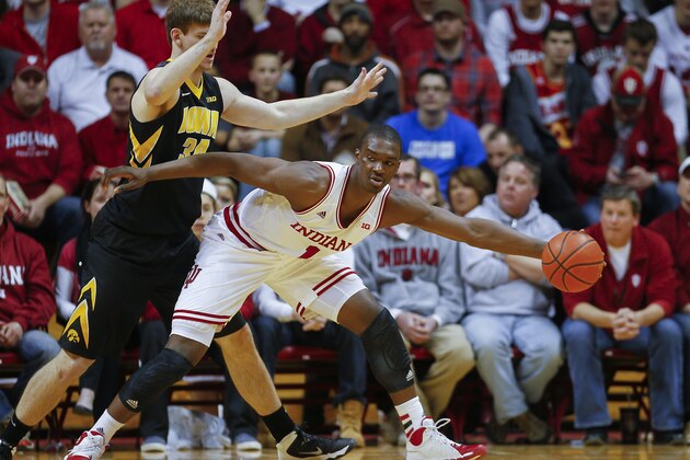 BLOOMINGTON, IN - FEBRUARY 27: Noah Vonleh #1 of the Indiana Hoosiers stretches to pull in the ball as Adam Woodbury #34 of the Iowa Hawkeyes guards at Assembly Hall on February 27, 2014 in Bloomington, Indiana. Indiana defeated Iowa 93-86. (Photo by Michael Hickey/Getty Images)