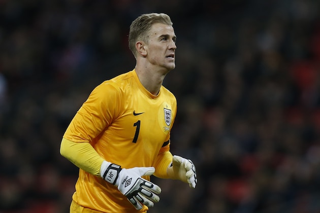 England's goalkeeper Joe Hart plays against Denmark during their international friendly soccer match at Wembley Stadium in London, Wednesday, March 5, 2014. (AP Photo/Sang Tan)
