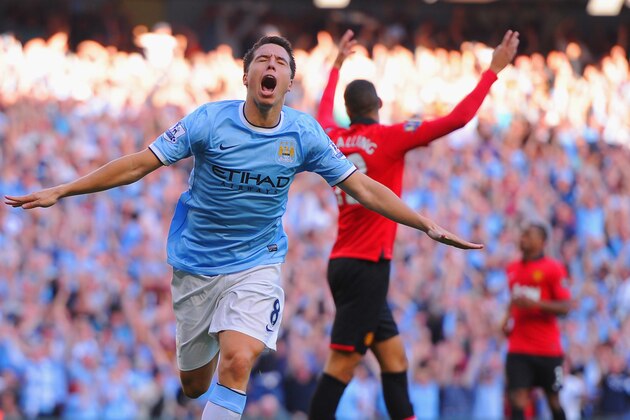 MANCHESTER, ENGLAND - SEPTEMBER 22: Samir Nasri of Manchester City celebrates as he scores their fourth goal during the Barclays Premier League match between Manchester City and Manchester United at the Etihad Stadium on September 22, 2013 in Manchester, England. (Photo by Michael Regan/Getty Images) MANCHESTER, ENGLAND - SEPTEMBER 22: Samir Nasri of Manchester City celebrates as he scores their fourth goal during the Barclays Premier League match between Manchester City and Manchester United at the Etihad Stadium on September 22, 2013 in Manchester, England. (Photo by Michael Regan/Getty Images)