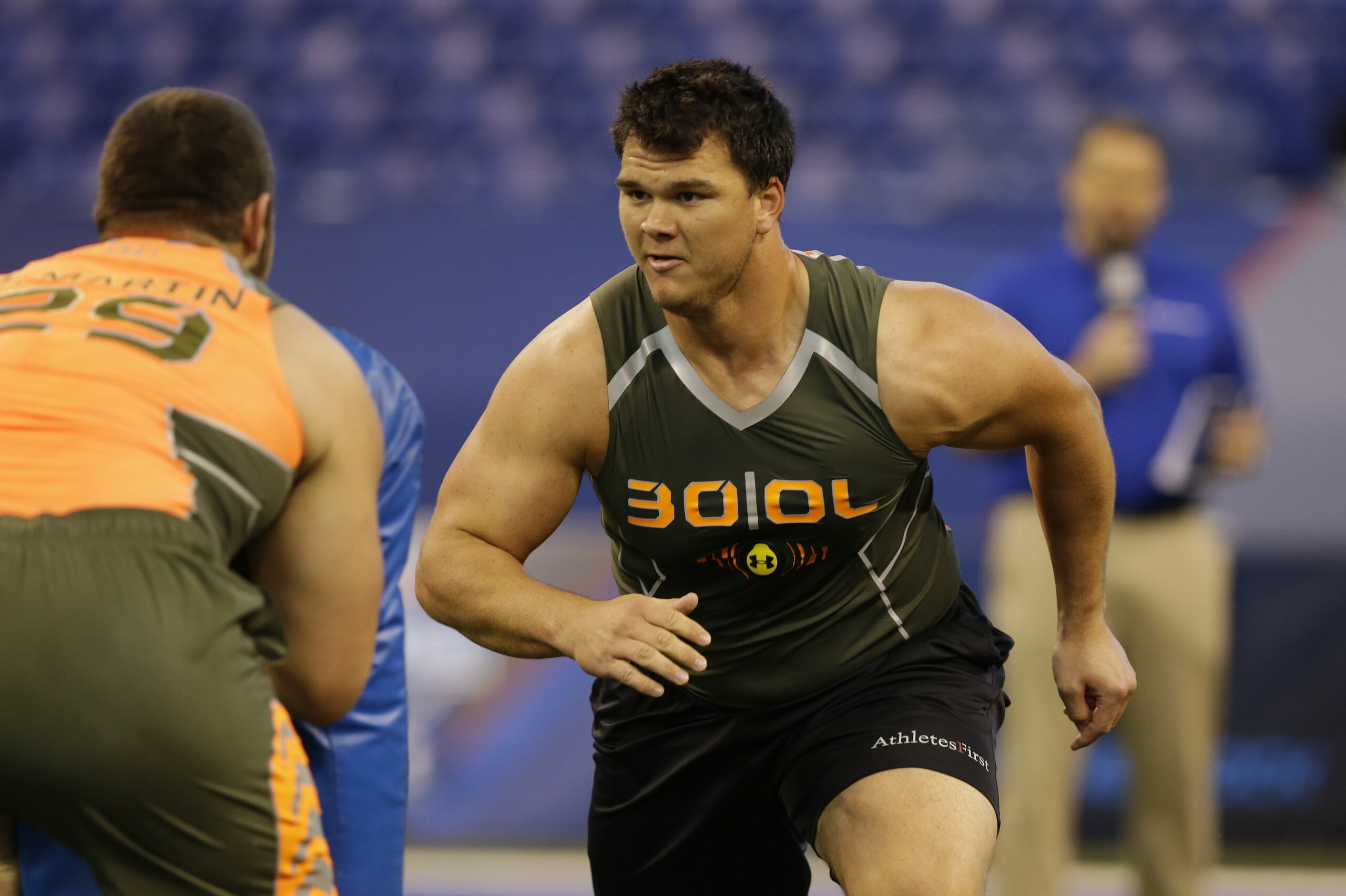 Texas A&M offensive lineman Jake Matthews runs a drill at the NFL football scouting combine in Indianapolis, Saturday, Feb. 22, 2014. (AP Photo/Michael Conroy)