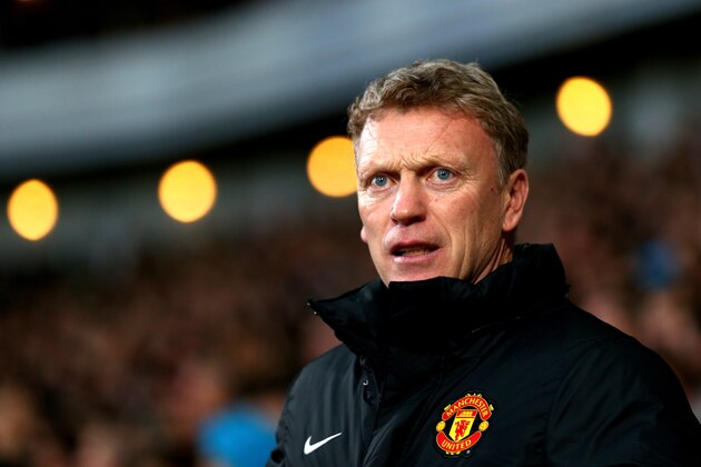 LONDON, ENGLAND - MARCH 22:  David Moyes the Manchester United manager looks on during the Barclays Premier League match between West Ham United and Manchester United at Boleyn Ground on March 22, 2014 in London, England.  (Photo by Paul Gilham/Getty Images)