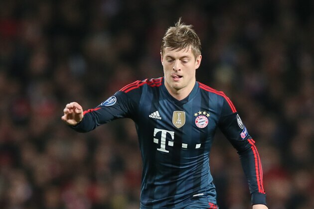 Bayern's Toni Kroos takes the ball forward during a Champions League, round of 16, first leg soccer match between Arsenal and Bayern Munich at the Emirates stadium in London, Wednesday, Feb. 19, 2014 .(AP Photo/Alastair Grant)