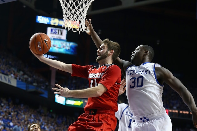 LEXINGTON, KY - DECEMBER 28: Luke Hancock #11 of the Louisville Cardinals shoots the ball while defended by Julius Randle #30 of the Kentucky Wildcats during the game at Rupp Arena on December 28, 2013 in Lexington, Kentucky. (Photo by Andy Lyons/Getty Images) LEXINGTON, KY - DECEMBER 28: Luke Hancock #11 of the Louisville Cardinals shoots the ball while defended by Julius Randle #30 of the Kentucky Wildcats during the game at Rupp Arena on December 28, 2013 in Lexington, Kentucky. (Photo by Andy Lyons/Getty Images)