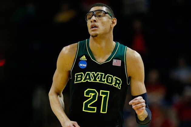 SAN ANTONIO, TX - MARCH 23: Isaiah Austin #21 of the Baylor Bears runs up the floor against the Creighton Bluejays during the third round of the 2014 NCAA Men's Basketball Tournament at the AT&T Center on March 23, 2014 in San Antonio, Texas.  (Photo by Tom Pennington/Getty Images)