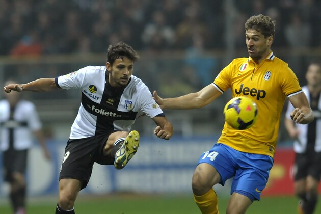 Parma's Dal Belo Felipe, of Brazil, left, vies for the ball with Juventus' Fernando Llorente Torres, of Spain, during their Serie A soccer match at Parma's Tardini stadium, Italy, Saturday, Nov. 2, 2013. (AP Photo/Marco Vasini) Parma's Dal Belo Felipe, of Brazil, left, vies for the ball with Juventus' Fernando Llorente Torres, of Spain, during their Serie A soccer match at Parma's Tardini stadium, Italy, Saturday, Nov. 2, 2013. (AP Photo/Marco Vasini)