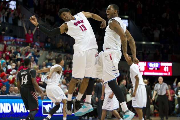 DALLAS, TX - FEBRUARY 8: Crandall Head #13 and Markus Kennedy #5 of the SMU Mustangs celebrate during a timeout against the Cincinnati Bearcats on February 8, 2014 at Moody Coliseum in Dallas, Texas.  (Photo by Cooper Neill/Getty Images)