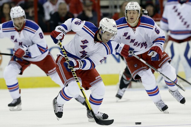 New York Rangers' Martin St. Louis (26) skates against the Carolina Hurricanes during the first period of an NHL hockey game in Raleigh, N.C., Friday, March 7, 2014. (AP Photo/Gerry Broome)