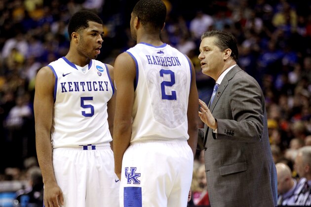 ST LOUIS, MO - MARCH 21: Head coach John Calipari speaks with Andrew Harrison #5 and Aaron Harrison #2 of the Kentucky Wildcats during the second round of the 2014 NCAA Men's Basketball Tournament against the Kansas State Wildcats at the Scottrade Center on March 21, 2014 in St Louis, Missouri. (Photo by Andy Lyons/Getty Images) ST LOUIS, MO - MARCH 21: Head coach John Calipari speaks with Andrew Harrison #5 and Aaron Harrison #2 of the Kentucky Wildcats during the second round of the 2014 NCAA Men's Basketball Tournament against the Kansas State Wildcats at the Scottrade Center on March 21, 2014 in St Louis, Missouri. (Photo by Andy Lyons/Getty Images)