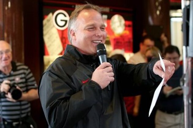 Georgia football coach Mark Richt answers questions from fans about Georgia's recruiting class on national signing day Wednesday, Feb. 5, 2014, in Athens, Ga. (AP Photo/Jason Getz)