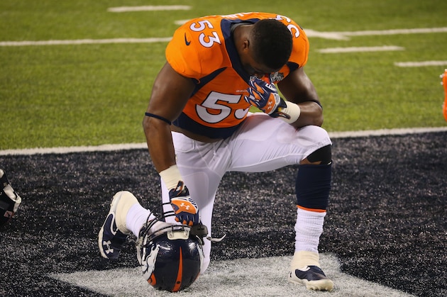 EAST RUTHERFORD, NJ - FEBRUARY 02: Middle linebacker Wesley Woodyard #52 of the Denver Broncos kneels in the endzone before playing against the Seattle Seahawks during Super Bowl XLVIII at MetLife Stadium on February 2, 2014 in East Rutherford, New Jersey. (Photo by Ronald Martinez/Getty Images) EAST RUTHERFORD, NJ - FEBRUARY 02: Middle linebacker Wesley Woodyard #52 of the Denver Broncos kneels in the endzone before playing against the Seattle Seahawks during Super Bowl XLVIII at MetLife Stadium on February 2, 2014 in East Rutherford, New Jersey. (Photo by Ronald Martinez/Getty Images)
