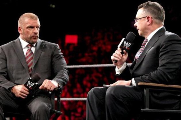 Truple H justifies himself to Micheal Cole on Monday's Raw.