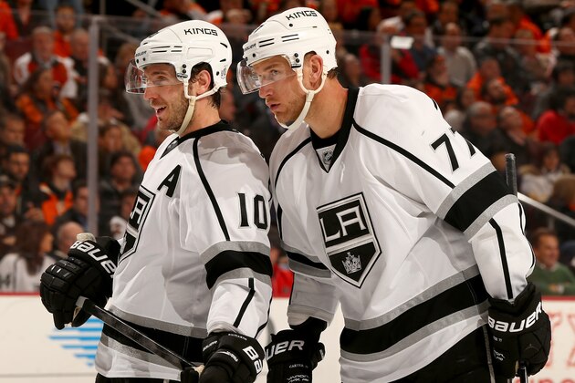 PHILADELPHIA, PA - MARCH 24:  Jeff Carter #77 talks with teammate Mike Richards #10 of the Los Angeles Kings in the second period against the Philadelphia Flyers at Wells Fargo Center on March 24, 2014 in Philadelphia, Pennsylvania.  (Photo by Elsa/Getty Images)