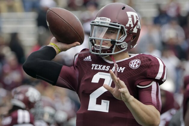 Texas A&M quarterback Johnny Manziel (2) warms up before an NCAA college football game against Mississippi State Saturday, Nov. 9, 2013, in College Station, Texas. (AP Photo/David J. Phillip)