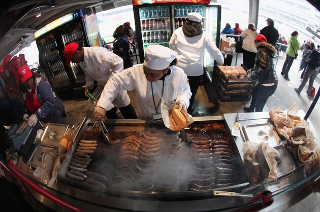 WASHINGTON, DC - MARCH 31: Vendors prepare food before the start of opening day between the Washington Nationals and Atlanta Braves at Nationals Park on March 31, 2011 in Washington, DC.  (Photo by Rob Carr/Getty Images)