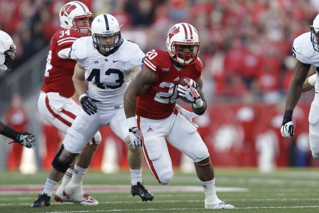 MADISON, WI - NOVEMBER 30: James White #20 of the Wisconsin Badgers runs with the football during the first half of play against the Penn State Nittany Lions at Camp Randall Stadium on November 30, 2013 in Madison, Wisconsin. (Photo by Mike McGinnis/Getty Images)