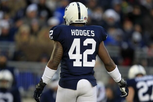 Penn State linebacker Gerald Hodges wears injured teammate Penn State linebacker Michael Mauti's jersey No. 42 during an NCAA college football game against Wisconsin in State College, Pa., Saturday, Nov. 24, 2012. (AP Photo/Gene J. Puskar)