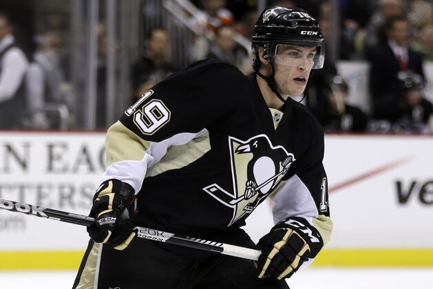 Pittsburgh Penguins right wing Beau Bennett (19) skates during the second period of an NHL hockey game against the Philadelphia Flyers in Pittsburgh Wednesday, Feb. 20, 2013. The Flyers won 6-5. (AP Photo/Gene J. Puskar)