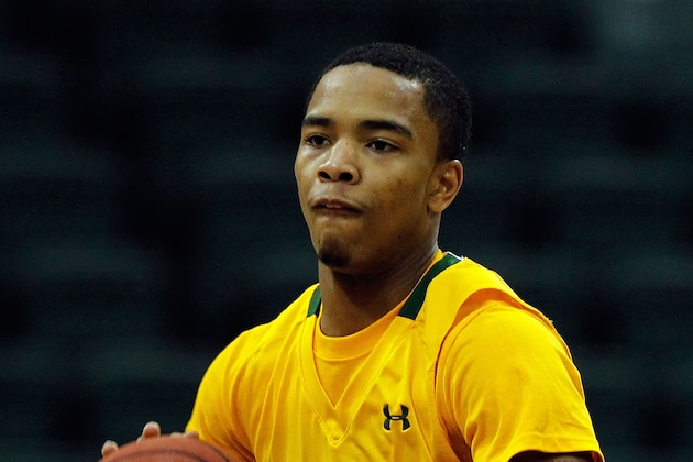 Dec 1, 2013; Orlando, FL, USA; Siena Saints guard Marquis Wright (1) passes the ball against the Purdue Boilermakers during the first half at ESPN Wide World of Sports. Mandatory Credit: Kim Klement-USA TODAY Sports