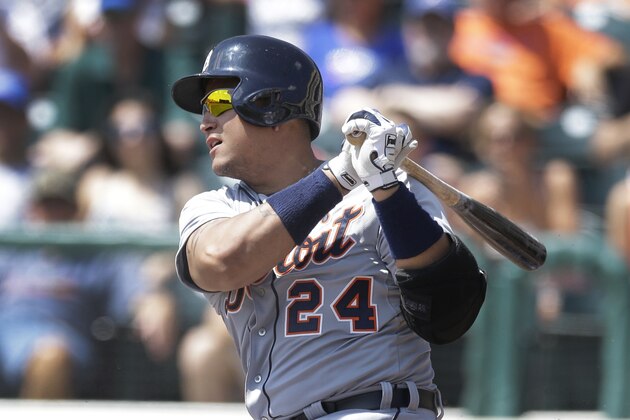 Detroit Tigers' Miguel Cabrera bats during the first inning of a spring exhibition baseball game against the Atlanta Braves in Kissimmee, Fla., Friday, March 21, 2014. (AP Photo/Carlos Osorio)