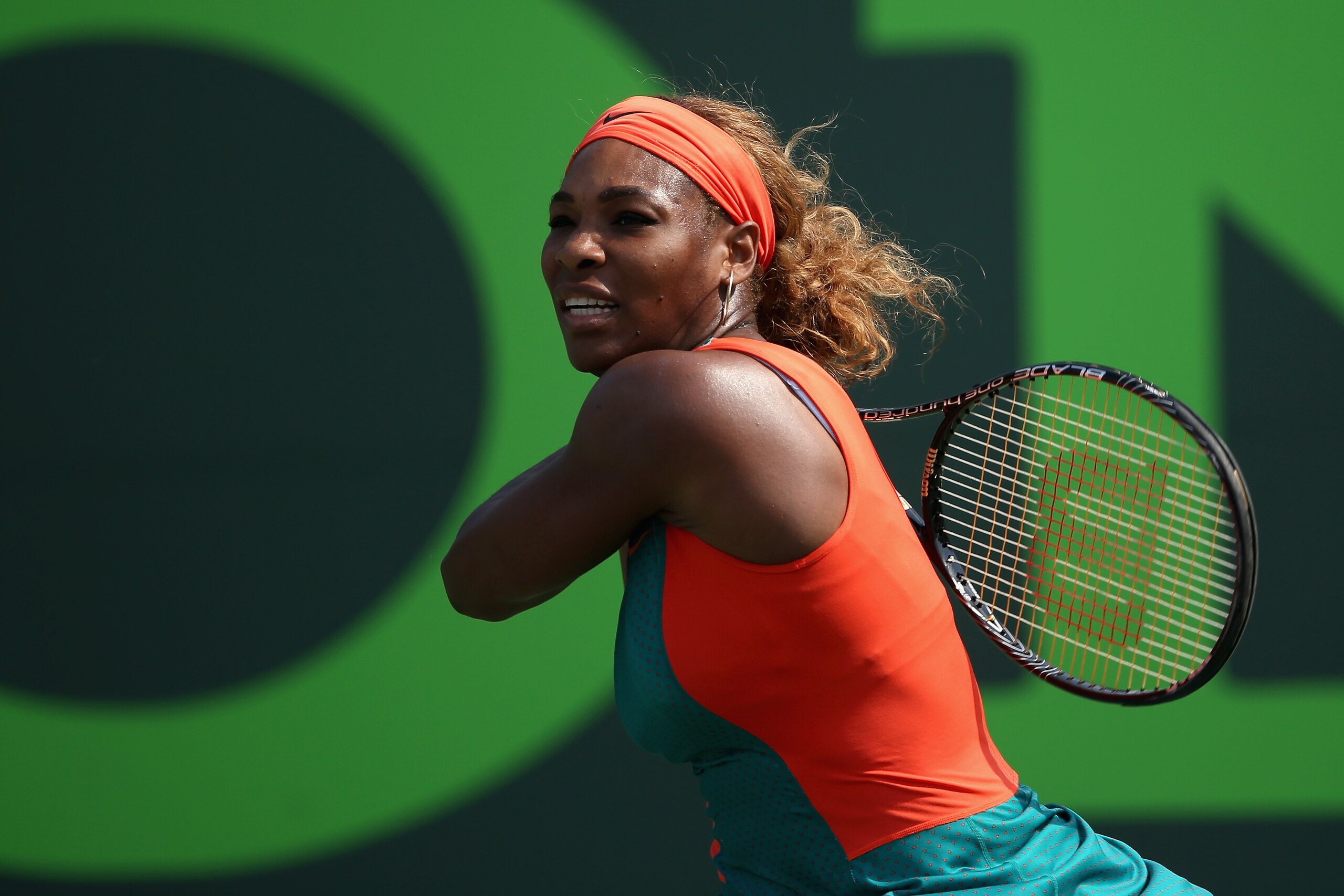 KEY BISCAYNE, FL - MARCH 24:  Serena Williams of the United States in action against Coco Vandeweghe of the United States during their fourth round match during day 8 at the Sony Open at Crandon Park Tennis Center on March 24, 2014 in Key Biscayne, Florida.  (Photo by Clive Brunskill/Getty Images)