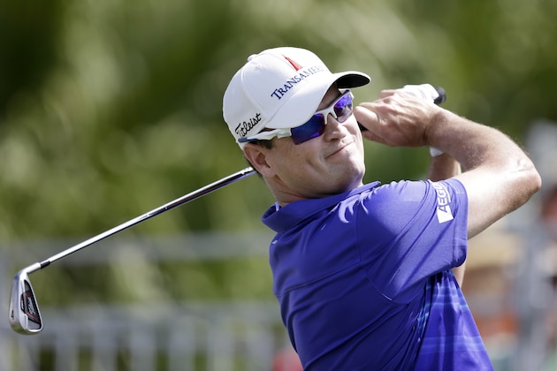 Zach Johnson tees off on the first hole during the final round of the Honda Classic golf tournament on Sunday, March 2, 2014, in Palm Beach Gardens, Fla. (AP Photo/Wilfredo Lee) Zach Johnson tees off on the first hole during the final round of the Honda Classic golf tournament on Sunday, March 2, 2014, in Palm Beach Gardens, Fla. (AP Photo/Wilfredo Lee)