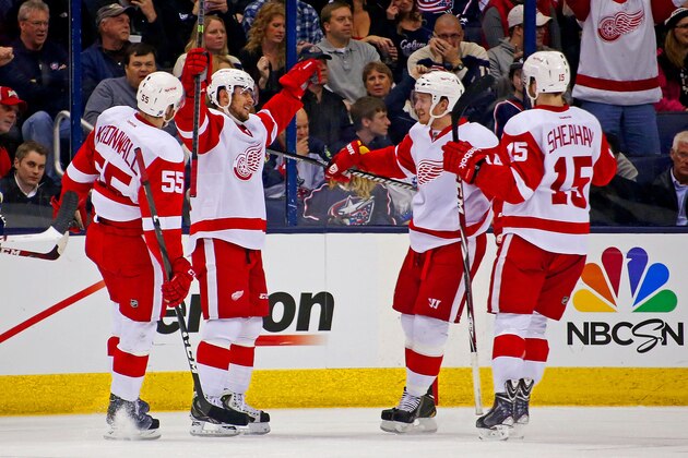 COLUMBUS, OH - MARCH 25:  Tomas Tatar #21 of the Detroit Red Wings celebrates while congratulating Gustav Nyquist #14 of the Detroit Red Wings for his second period goal against the Columbus Blue Jackets on March 25, 2014 at Nationwide Arena in Columbus, Ohio. (Photo by Kirk Irwin/Getty Images)