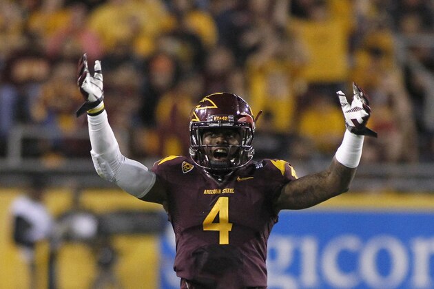 TEMPE, AZ - NOVEMBER 16:  Defensive back Alden Darby #4 of the Arizona State Sun Devils celebrates a defensive stand against the Oregon State Beavers during the fourth quarter of their college football game at Sun Devil Stadium on November 16, 2013 in Tempe, Arizona.  (Photo by Ralph Freso/Getty Images)