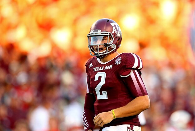 Sep 21, 2013; College Station, TX, USA; Texas A&M Aggies quarterback Johnny Manziel (2) against the SMU Mustangs in the first half at Kyle Field. Mandatory Credit: Mark J. Rebilas-USA TODAY Sports
