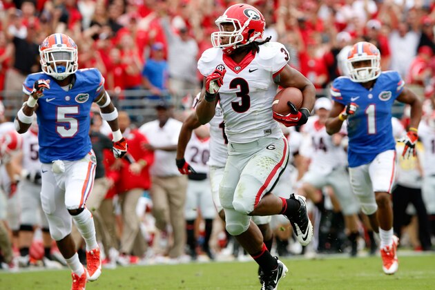 JACKSONVILLE, FL - NOVEMBER 02:  Todd Gurley #3 of the Georgia Bulldogs runs for yardage during the game against the Florida Gators at EverBank Field on November 2, 2013 in Jacksonville, Florida.  (Photo by Sam Greenwood/Getty Images)
