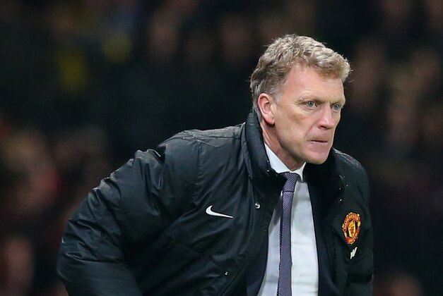MANCHESTER, ENGLAND - MARCH 25:  Manchester United Manager David Moyes reacts during the Barclays Premier League match between Manchester United and Manchester City at Old Trafford on March 25, 2014 in Manchester, England.  (Photo by Alex Livesey/Getty Images)