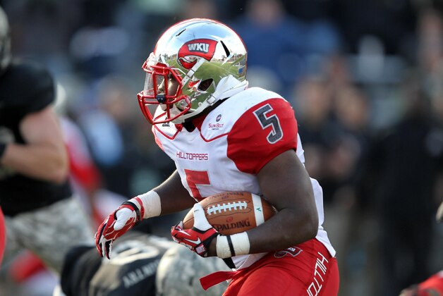 Nov 9, 2013; West Point, NY, USA; Western Kentucky Hilltoppers running back Antonio Andrews (5) rushes the ball during the second half against the Army Black Knights at Michie Stadium. Mandatory Credit: Danny Wild-USA TODAY Sports