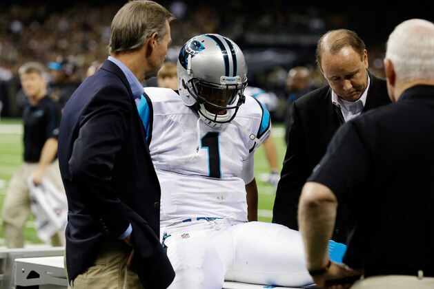 Carolina Panthers' Cam Newton is attended to after injuring his leg during the second half of an NFL football game against the New Orleans Saints Sunday, Dec. 30, 2012, in New Orleans. (AP Photo/Bill Haber) Carolina Panthers' Cam Newton is attended to after injuring his leg during the second half of an NFL football game against the New Orleans Saints Sunday, Dec. 30, 2012, in New Orleans. (AP Photo/Bill Haber)