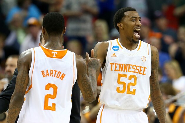 RALEIGH, NC - MARCH 23: Antonio Barton #2 and Jordan McRae #52 of the Tennessee Volunteers celebrate late in the game against the Mercer Bears during the third round of the 2014 NCAA Men's Basketball Tournament at PNC Arena on March 23, 2014 in Raleigh, North Carolina.  (Photo by Streeter Lecka/Getty Images)