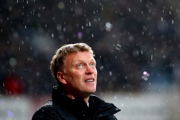 LONDON, ENGLAND - MARCH 22:  David Moyes the Manchester United manager looks on prior to kickoff during the Barclays Premier League match between West Ham United and Manchester United at Boleyn Ground on March 22, 2014 in London, England.  (Photo by Julian Finney/Getty Images)