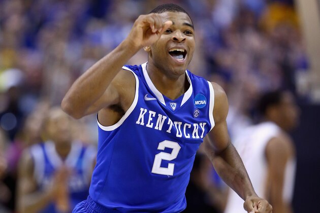 ST LOUIS, MO - MARCH 23:  Andrew Harrison #2 of the Kentucky Wildcats celebrates after defeating the Wichita State Shockers 78 to 76 during the third round of the 2014 NCAA Men's Basketball Tournament at Scottrade Center on March 23, 2014 in St Louis, Missouri.  (Photo by Andy Lyons/Getty Images)