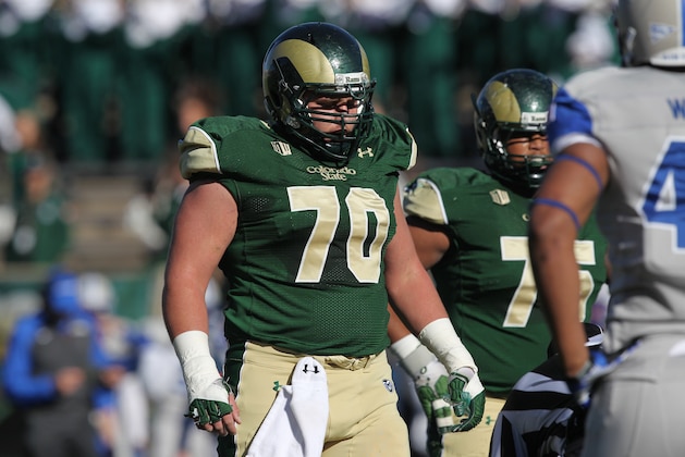 Colorado State center Weston Richburg steps to line of scrimmage against Air Force in the first quarter of an NCAA football game in Fort Collins, Colo., on Saturday, Nov. 30, 2013. (AP Photo/David Zalubowski)