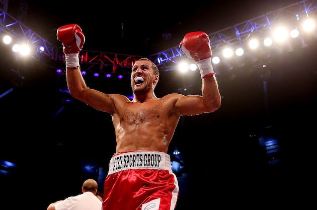 CARDIFF, WALES - AUGUST 17:  Sergey Kovalev celebrates his victory over Nathan Cleverly during the WBO World Light-Heavyweight Championship bout at Motorpoint Arena on August 17, 2013 in Cardiff, Wales.  (Photo by Scott Heavey/Getty Images)