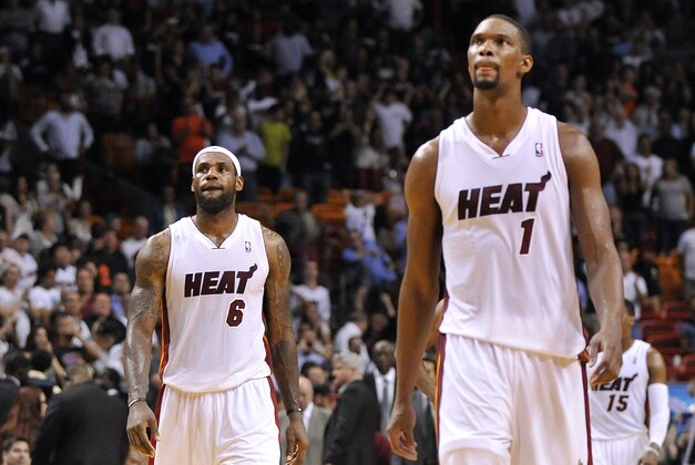 Mar 24, 2014; Miami, FL, USA; Miami Heat forward LeBron James (left) and teammate center Chris Bosh (right) during the second half against the Portland Trail Blazers at American Airlines Arena. Miami won 93-91.  Mandatory Credit: Steve Mitchell-USA TODAY Sports