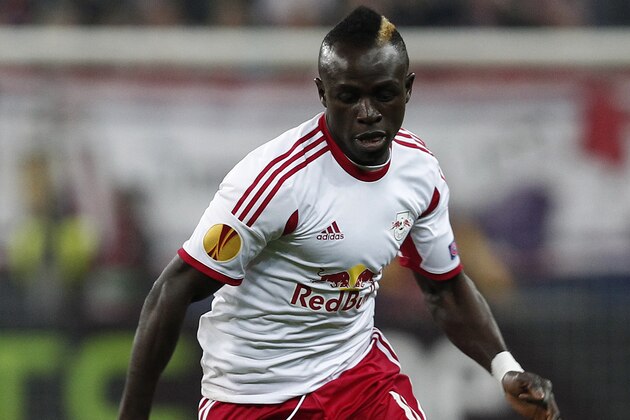 SALZBURG, AUSTRIA - MARCH 20:  Sadio Mane of Salzburg runs with the ball during the UEFA Europa League Round of 16 match between FC Salzburg and FC Basel 1893 at Stadion Salzburg on March 20, 2014 in Salzburg, Austria.  (Photo by Simon Hausberger/Getty Images)