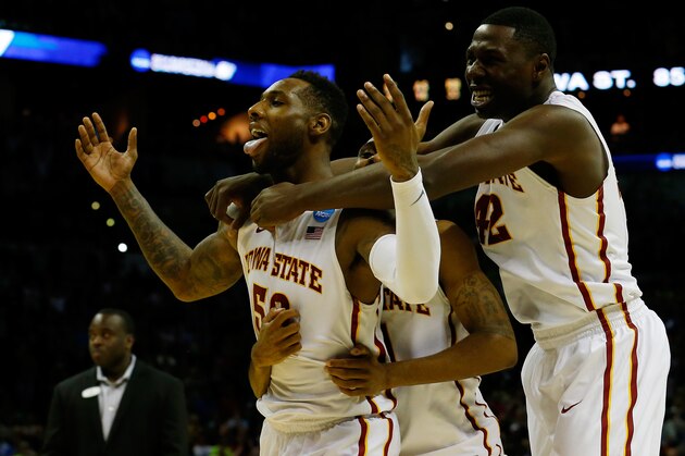 SAN ANTONIO, TX - MARCH 23:  DeAndre Kane #50, Monte Morris #11 and Daniel Edozie #42 of the Iowa State Cyclones celebrate after defeating the North Carolina Tar Heels 85-83 in the third round of the 2014 NCAA Men's Basketball Tournament at the AT&T Center on March 23, 2014 in San Antonio, Texas.  (Photo by Tom Pennington/Getty Images)