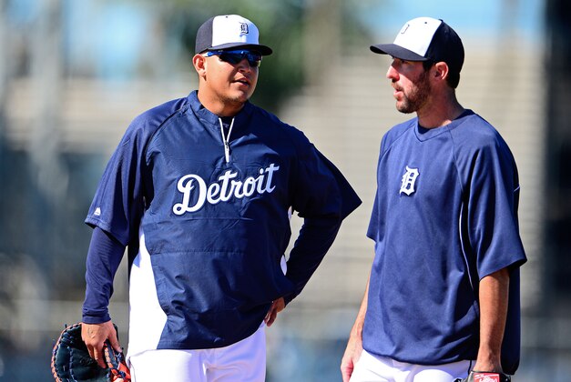 Feb 18, 2014; Lakeland, FL, USA; Detroit Tigers first baseman Miguel Cabrera (left) talks with Justin Verlander during a team practice at Joker Marchant Stadium. Mandatory Credit: Andrew Weber-USA TODAY Sports