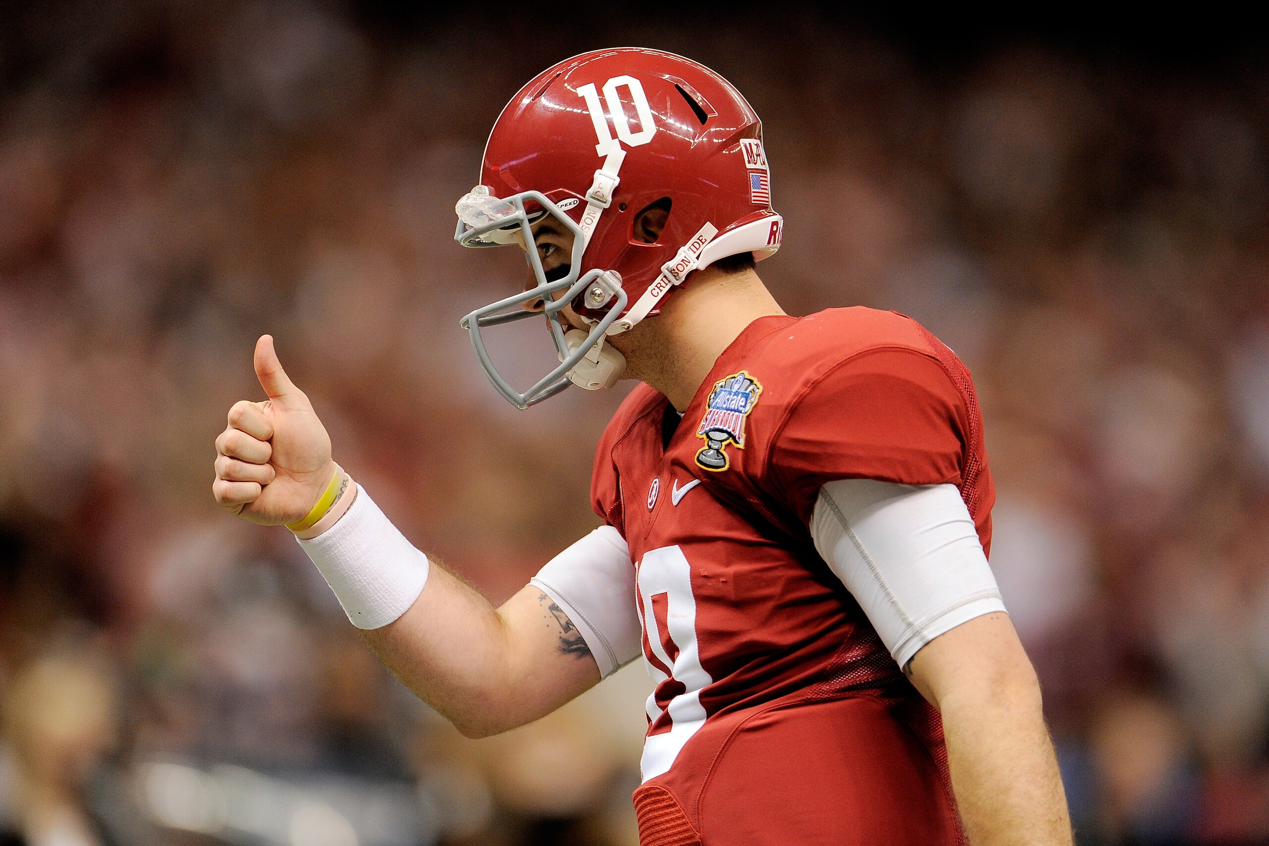 NEW ORLEANS, LA - JANUARY 02:  AJ McCarron #10 of the Alabama Crimson Tide reacts against the Oklahoma Sooners during the Allstate Sugar Bowl at the Mercedes-Benz Superdome on January 2, 2014 in New Orleans, Louisiana.  (Photo by Stacy Revere/Getty Images)