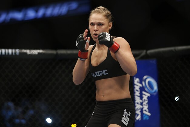 Ronda Rousey gets ready for her UFC 157 women's bantamweight championship mixed martial arts match with Liz Carmouche in Anaheim, Calif., Saturday, Feb. 23, 2013. Rousey won by tapout in the first round. (AP Photo/Jae C. Hong)