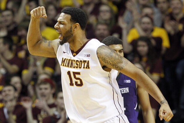 Minnesota forward Maurice Walker reacts after making a shot to tie the game during the first half of an NCAA college basketball game against Northwestern in Minneapolis, Saturday, Feb. 1, 2014. Despite Walker's team-high 14 points, Northwestern won 55-54. (AP Photo/Ann Heisenfelt)