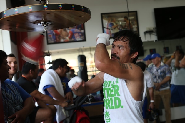 GENERAL SANTOS, PHILIPPINES - MARCH 04:  Manny Pacquiao takes part in a training session on March 4, 2014 in General Santos, Philippines. Pacquiao will fight for WBO welterweight championship rematch against Timothy Bradley on April 12, 2014 at the MGM Grand in Las Vegas, Nevada. (Photo by Jeoffrey Maitem/Getty Images)