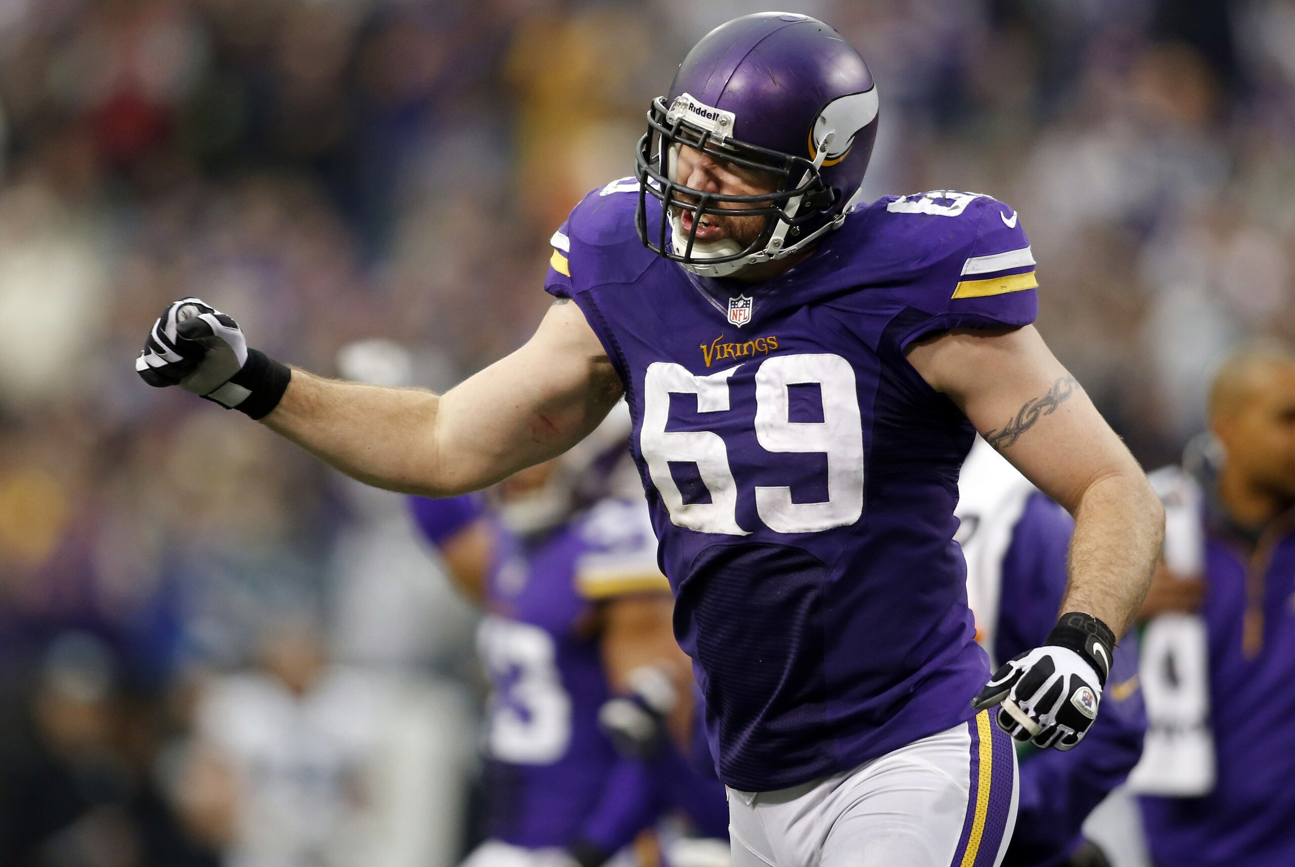 Dec 15, 2013; Minneapolis, MN, USA; Minnesota Vikings defensive end Jared Allen (69) celebrates a failed fourth down attempt by the Philadelphia Eagles in the third quarter at Mall of America Field at H.H.H. Metrodome. The Vikings win 48-30. Mandatory Credit: Bruce Kluckhohn-USA TODAY Sports