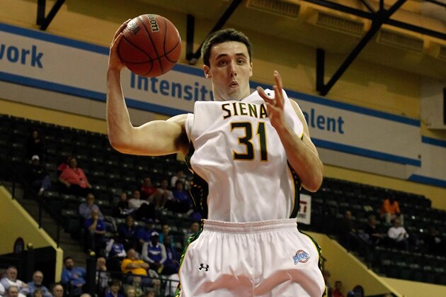 Nov 28, 2013; Orlando, FL, USA; Siena Saints forward Brett Bisping (31) grabs a rebound against the Memphis Tigers during the first half at ESPN Wide World of Sports. Mandatory Credit: Kim Klement-USA TODAY Sports