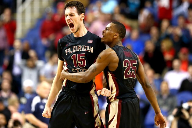 GREENSBORO, NC - MARCH 13:  Boris Bojanovsky #15 of the Florida State Seminoles reacts afer making the game winning dunk with teammate Aaron Thomas #25 to defeat the Terrapins 67-65 during the second round of the 2014 Men's ACC Basketball Tournament at Greensboro Coliseum on March 13, 2014 in Greensboro, North Carolina.  (Photo by Streeter Lecka/Getty Images)