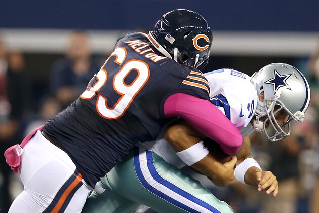 ARLINGTON, TX - OCTOBER 01: Henry Melton #69 of the Chicago Bears sacks quarterback Tony Romo #9 of the Dallas Cowboys in the first quarter at Cowboys Stadium on October 1, 2012 in Arlington, Texas. (Photo by Ronald Martinez/Getty Images) ARLINGTON, TX - OCTOBER 01: Henry Melton #69 of the Chicago Bears sacks quarterback Tony Romo #9 of the Dallas Cowboys in the first quarter at Cowboys Stadium on October 1, 2012 in Arlington, Texas. (Photo by Ronald Martinez/Getty Images)