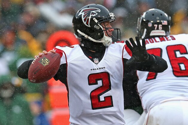 GREEN BAY, WI - DECEMBER 08:  Matt Ryan #2 of the Atlanta Falcons passes against the Green Bay Packers at Lambeau Field on December 8, 2013 in Green Bay, Wisconsin. The Packers defeated the Falcons 22-21.  (Photo by Jonathan Daniel/Getty Images)